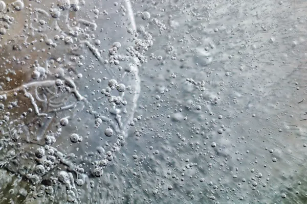 Water main break in Cleveland’s Hough neighborhood traps vehicles in ice at key intersection